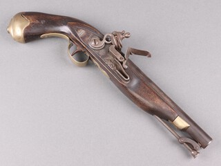 A flintlock pistol with stirrup ram rod, the 21cm barrel marked GR and with X, the lock marked Tower 