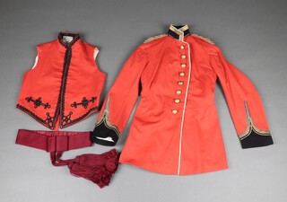 Guthrie Valentine. of 12 Cork Street, London, an Indian Army Lieutenant's tunic dated January 15, together with a dress belt and a mess waistcoat dated July 20, labelled Captain CEE Palin 
