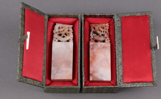 A pair of Chinese carved hardstone seals 11cm, boxed 