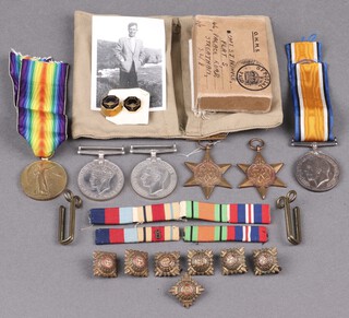 A pair of medals comprising British War medal and Victory medal to 43846 Pte. W T Williams, Royal Welsh Fusiliers, a group of 4 medals attributable to Captain Stanley J Pringle of Flat 5, 46 Palace Road, Streatham comprising 1939-45 Star, Africa Star with clasp 8th Army, British Defence and War medal in original cardboard box (no ribbons) and various pips, medal ribbons and photographs of the recipient 