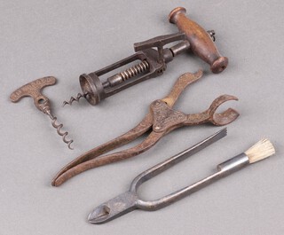 A pair of polished steel champagne wire cutters, a Lund patent 2 piece lever cork screw, and a rack and pinion corkscrew 
