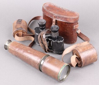 Broadhurst Clarkson and Co., 63 Farringdon Road, a 4 draw metal and leather telescope, contained in a leather carrying case 