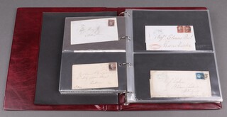 A Royal Mail Postal History album including stamped envelopes with penny reds, plate 64 to 129 and others 