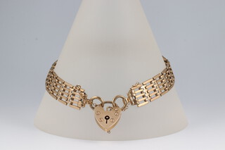 A 9ct gold gate link bracelet with padlock clasp, 18cm, 15.5g 