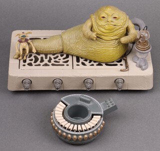 Star Wars by Palitoy, a Jabba The Hut play set comprising Jabba the Hutt, hookah pipe and bowl, Salacious Crumb and throne base, together with Max Rebo's organ and Droopy McCool and Sy Snootles's microphones 