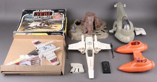 Star Wars by Palitoy, a collection of incomplete/damaged vehicles and play sets, to include Slave I together with carbonite (1 fin damaged),  an X-Wing, a Return of The Jedi X-Wing (in damaged box), Dagobah (Yoda's hut, with crates) and a Cloud Car (missing hatch) 