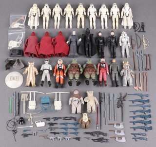 Star Wars by Palitoy, a collection of original vintage figures to include Last 17 Lumat with bow but no hood (28 in total), together with a large collection of Star Wars weaponry (Snowtrooper x 2, Imperial Guards x 3, Stormtrooper x 7, Gamorian Guard x 2, A-Wing Pilot, X-Wing Pilot, The Emperor, Darth Vada, Wicket, Lowgray, Chief Cherpa, Lumat, Imperial Commander x 2, AT-AT, AT-AT-Driver, Commander, AT-ST Driver) 