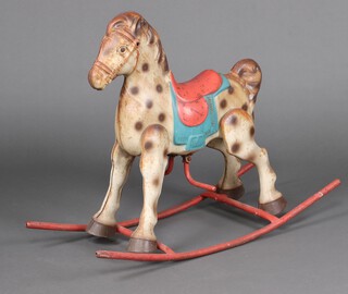 A 1960's Mobo painted pressed metal child's rocking horse, on a tubular steel rocker 77cm h