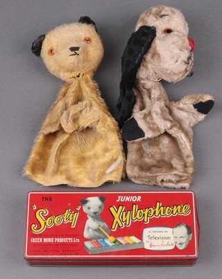 A late 1950's early 60's pair of hand puppets of Sooty and Sweep (Sweep missing ear) together with a boxed Sooty xylophone 