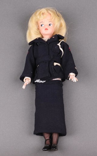 Sindy by Pedigree, a 1960's Sindy doll in unknown black Wren style uniform outfit 27cm 
