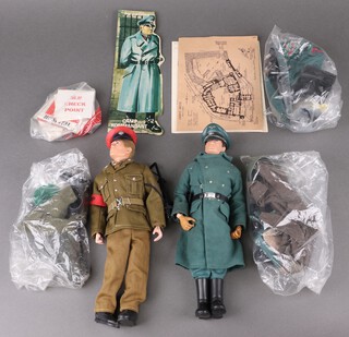 Action Man by Palitoy, an Action Man figure in Camp Kommandant uniform and a later figure in Royal Military Policeman outfit with accessories and signage, together with a German Staff Officer military outfit and 2 others 