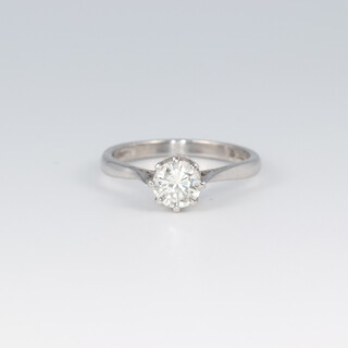 An 18ct white gold solitaire diamond ring, approx. 0.75ct, size L, 
