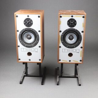 A pair of Mission 770 Hi-fi speakers in teak frames, (no grills), together with a pair of unassociated stands 