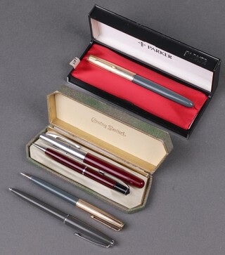 A Conway Stuart Golden Platignum fountain pen in red, a ditto propelling pencil cased and a Parker fountain pen in grey case and rolled gold cap, ditto propelling pencil and a ballpoint pen 