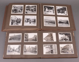 An album of black and white photographs relating to 115 Squadron Edinburgh 38th Royal Artillery Winter 1941-45 and  an Egyptian embossed leather photograph album 