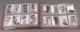 A leather album containing black and white photographs dating from 1944 of army squadrons on various manoeuvres including Mossa, Edinburgh, Syria, Castel Del Rio, Casola vol senio, Trieste etc 