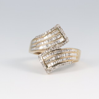 A 9ct gold and diamond set cross-over ring, size L, 4.5g