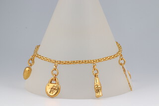 A high carat yellow metal charm bracelet, 19cm, 11.9g