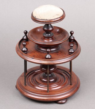 A Victorian circular 2 tier bobbin stand, the upper section with pin cushion 23cm h x 14cm 