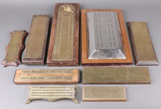 A rectangular chrome and oak cribbage board together with 7 other brass mounted cribbage boards 
