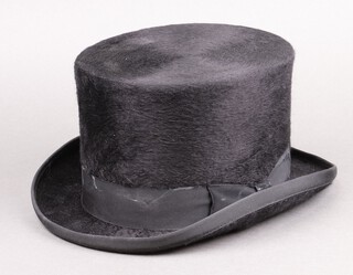 A short black top hat, size 7 1/4 
