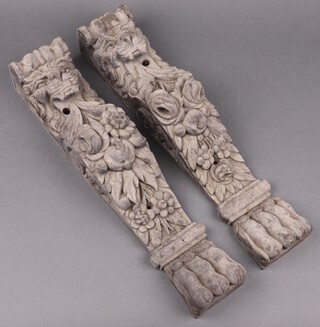 A pair of Victorian carved oak caryatids in the form of lions 50cm x 10cm 