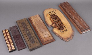 Six various wooden cribbage boards 