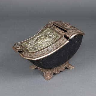 A Continental cast iron coal box of scroll from, on panel supports 33cm h x 50cm w x 30cm d 