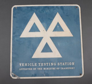 A cast aluminium sign "Vehicle Testing Station Approved by The Ministry of Transport" 64cm h x 61cm w 