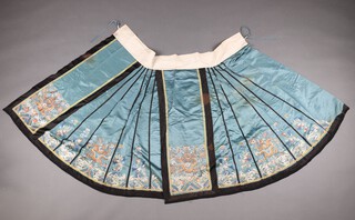 A Chinese 19th Century pale blue silk skirt embroidered dragons and phoenix, possibly used as a lower skirt or pleat for a ladies robe