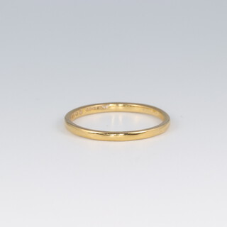 A 22ct gold wedding band, size L 1/2, 1.7g