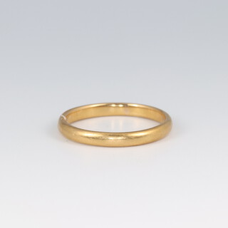 A 22ct gold wedding band, size N 1/2, 2.9g