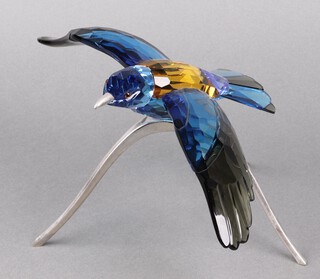A Swarovski Crystal  2011 figure of a blue Paradise Roller Bird on a metal stand 16cm, boxed 
