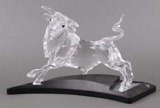 A Swarovski Crystal 2004 figure of a bull - The Bull Stier, 17cm, complete with base, a limited edition figure of 10,000 with certificate, booklet and hard travel case 