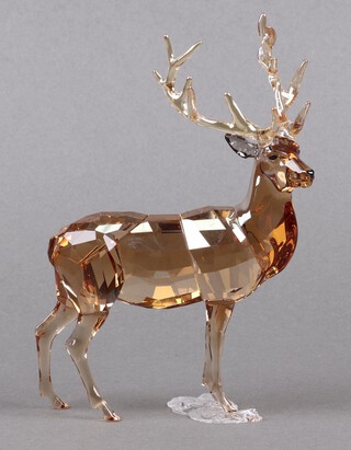 A Swarovski Crystal Collectors Club 2020 annual edition figure of a stag - Stag Alexander, in orange, 16cm, boxed  