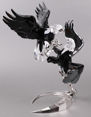 A Swarovski Crystal 2015, 120th year anniversary limited edition figure of eagles -  Pair of Eagles on a metal stand 36cm, complete with hard carrying case 