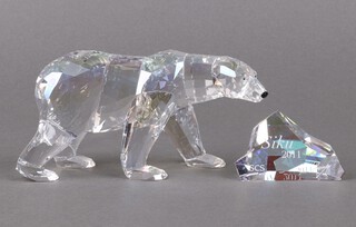 A Swarovski Crystal Collectors Club 2011 annual edition figure of a bear - Siku Polar Bear 8cm together with a table sign marked 2011, boxed  