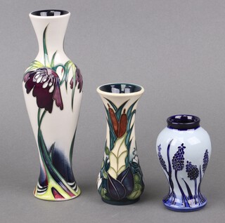 Nicola Slaney for The Moorcroft Collector's Club, a limited edition 2007 vase 21cm, a Rachel Bishop for Moorcroft Lamia vase 12cm and an Elise Adama for Moorcroft Muscari pattern vase 10cm 