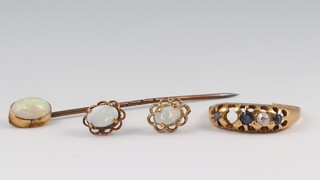 A gold testing as 18ct ring set 1 (ex 2) diamond and 3 blue stones, (ring cut) 2.1g, together with an opal set tie pin and pair of opal set ear studs
