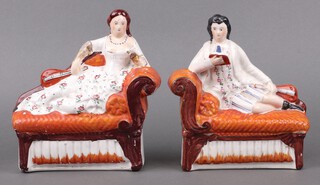 A pair of 19th Century Staffordshire figures of reclining lady and gentleman with musical instruments 23cm, together with a figure of a standing Scots lady 32cm and 1 other of a huntsman with gun and dog 38cm  