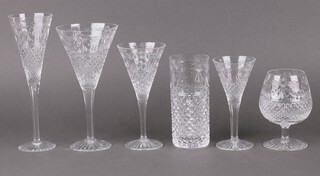 A suite of 36 Stuart Crystal Beaconsfield pattern cut glassware including 6 brandy balloons, 6 large tumblers, 6 liqueur glasses, 6 red wine glasses, 6 white wine glasses and 6 champagne flutes 