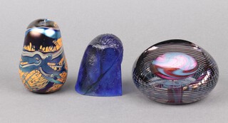 An Okra Art Glass pear shaped vase 9cm, an Art Glass paperweight signed to the base David Boy 10cm and a blue glass paperweight in the form of an owls head 8cm 