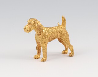 A gold marked 750 brooch in the form of Terrier, with pin marked 9ct, 12.6g gross