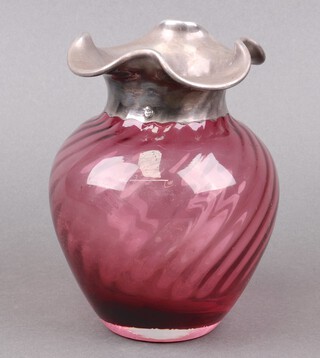 A Dartington cranberry glass vase of swirl form with silver mount 16cm 