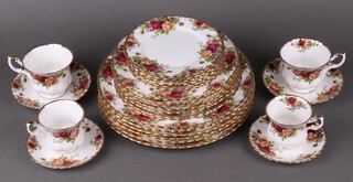 A 45 piece Royal Albert Old Country Rose pattern dinner/tea service, 6 dinner plates, 7 side plates, 6 cups, 5 saucers (2 cups cracked), 7 coffee cups, 7 saucers (2 saucers marked) 