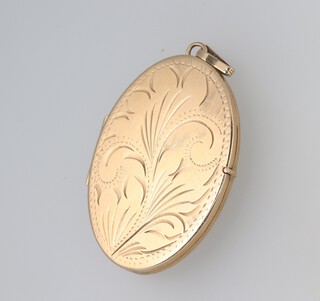 A 9ct gold oval locket 4cm h x 3cm 2, 9.8g