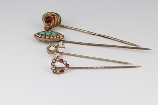 Four gilt metal stick pins, one set turquoise and demi pearls and with original box 