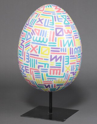 Aries Moross (Kate Moross) (British, b.1986) "Oooof", painted fibreglass construction on a metal stand, signed and dated 2012, 96cm x 50cm x 50cm. Note: Created for the 2012 Faberge Big Egg Hunt in London, this painted egg sculpture was one of more than 200 artworks featured in a city-wide public art trail in aid of charity. Installed in the Covent Garden zone, it formed part of a large-scale scavenger hunt that transformed the capital into an open-air gallery