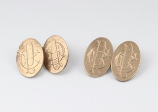 A pair of gold marked 9ct oval cufflinks, monogrammed, 7.5g