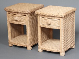 A pair of of rattan bedside tables fitted a drawer above recess 59cm h x 48cm w x 48cm d 